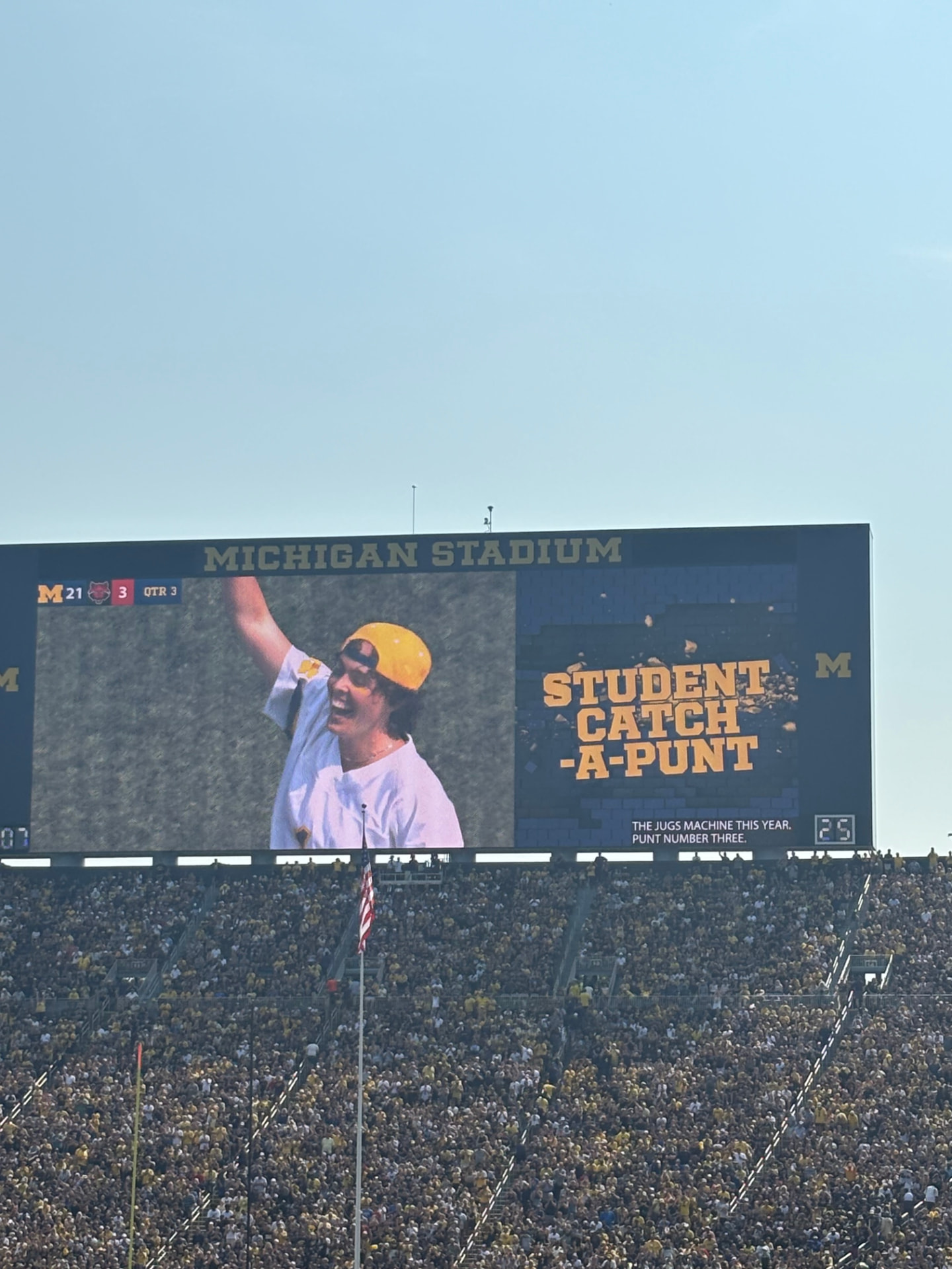 Maddie appearing on the Michigan Stadium scoreboard