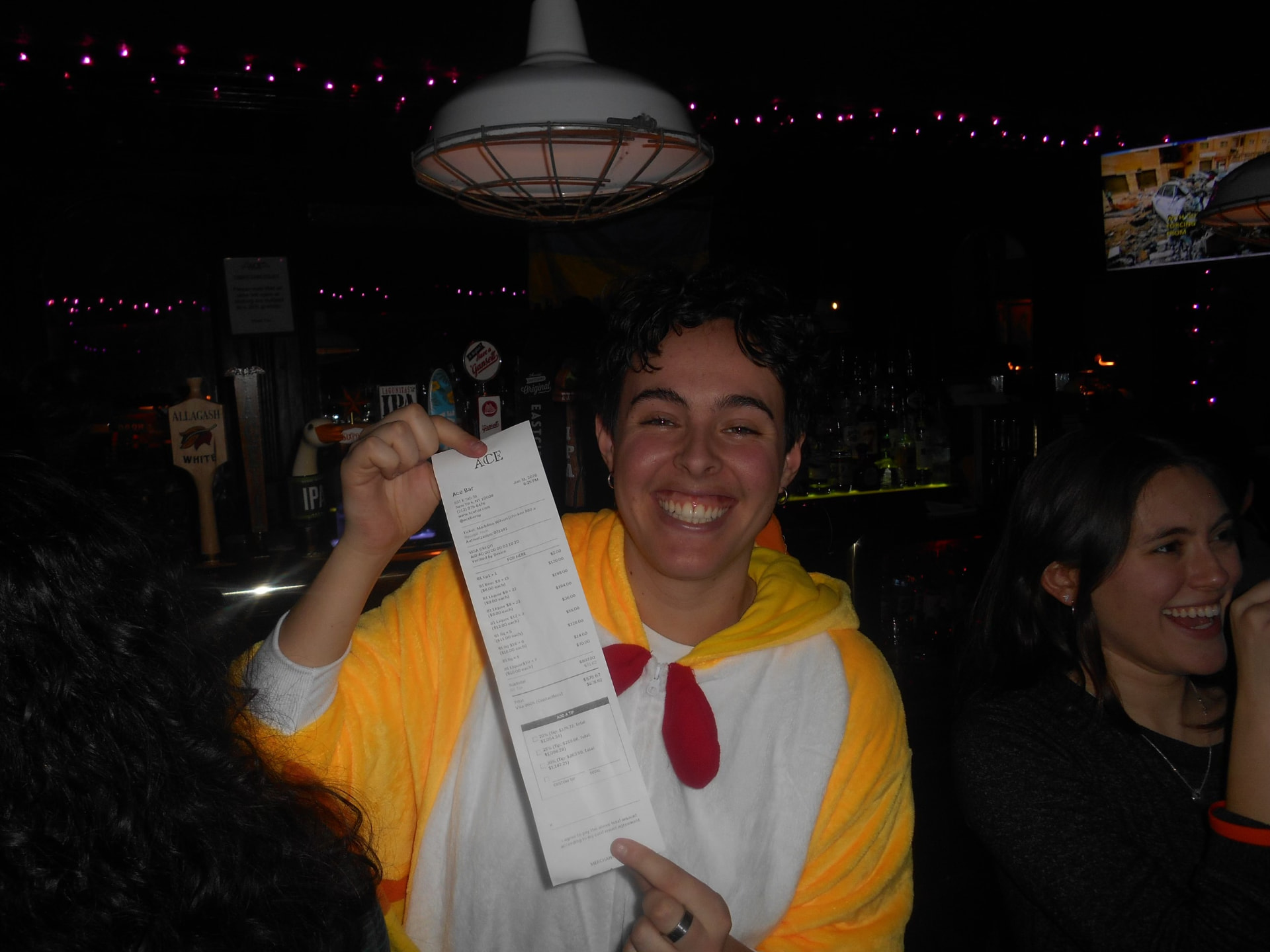 Maddie smiling in a costume at a themed gathering